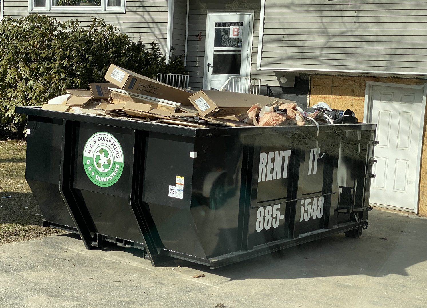 GSDumps filled dumpster ready for pickup